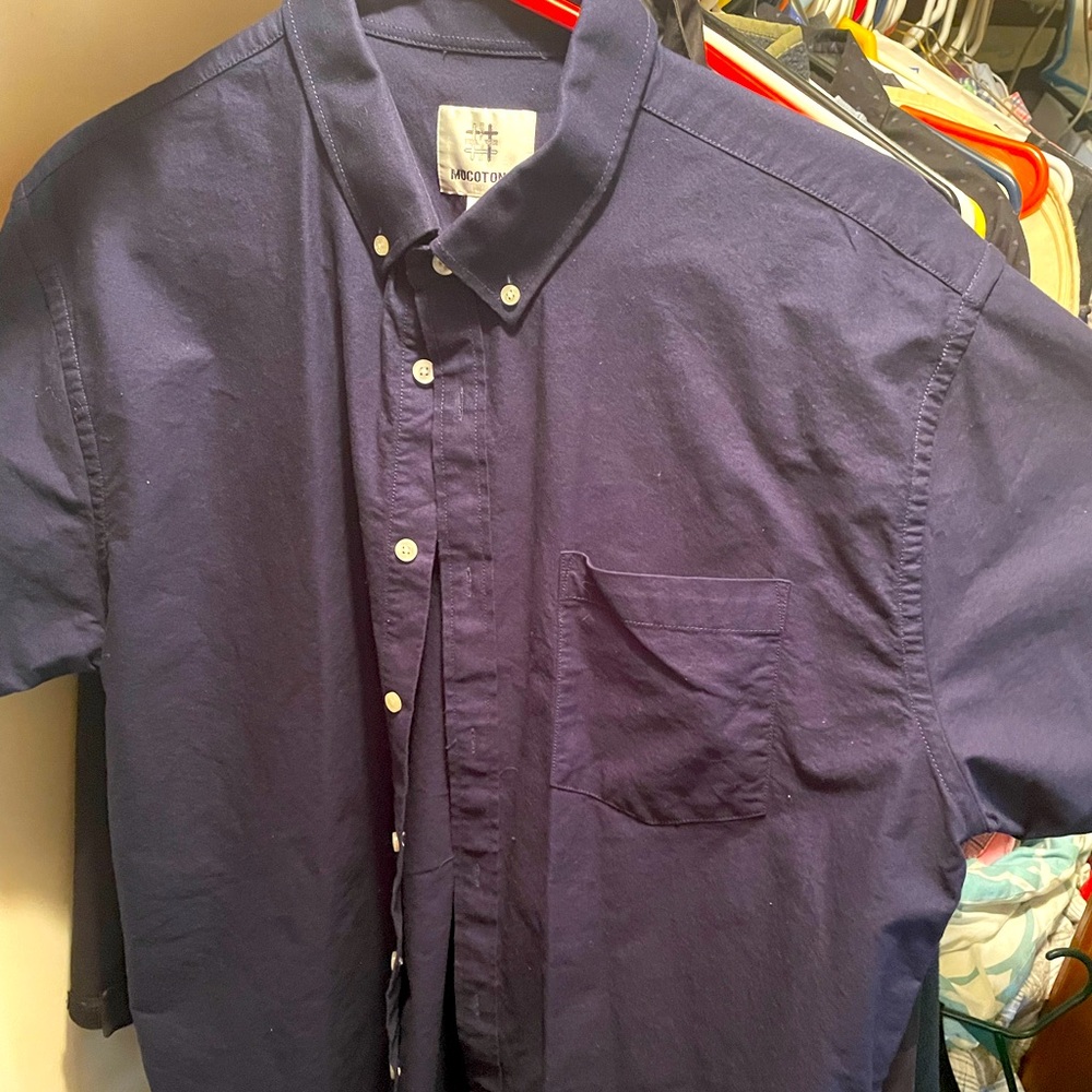 Large blue Hawaiian T-shirt.